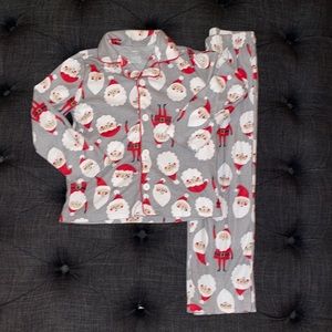 Carters Kid 2-Piece Santa Coat-Style PJs SZ 7 and SZ 6 for sale separate.